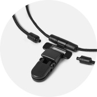 SafeLine hearing aid retention clip with a black cord and magnetic breakaway clasp for secure and safe use.