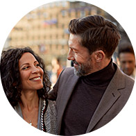 Image shows man and woman looking at each other