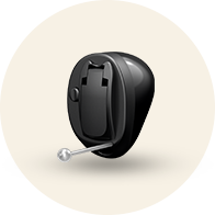 A sleek black in-the-ear hearing aid with a small external pull tab, designed for discreet wear, is centered against a neutral beige background, emphasizing its advanced audiology functionality.
