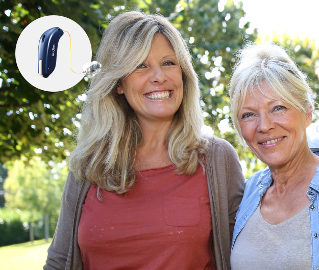 Image shows person wearing Audimini hearing aids