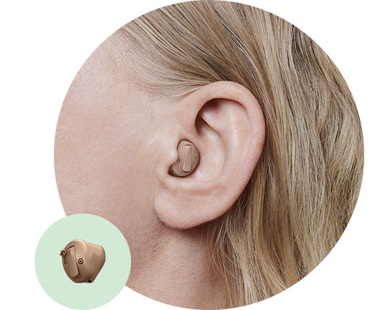 In-the-canal hearing aid placed discreetly in a person's ear.